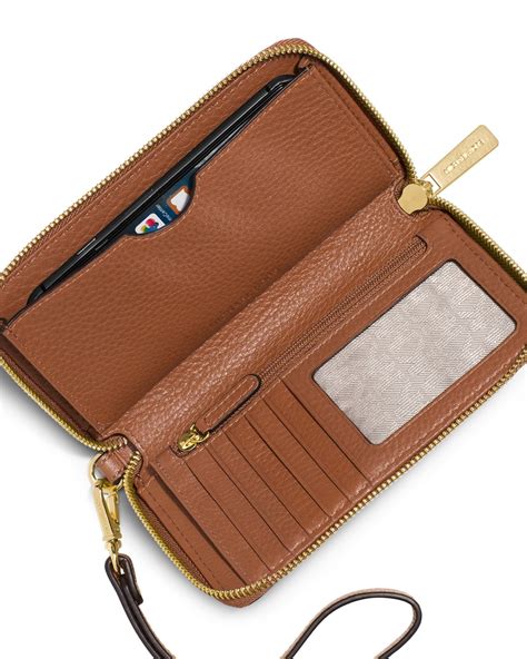 michael michael kors women's multifunction phone case wallet|MICHAEL Michael Kors Large Flat Multifunction Phone Case.